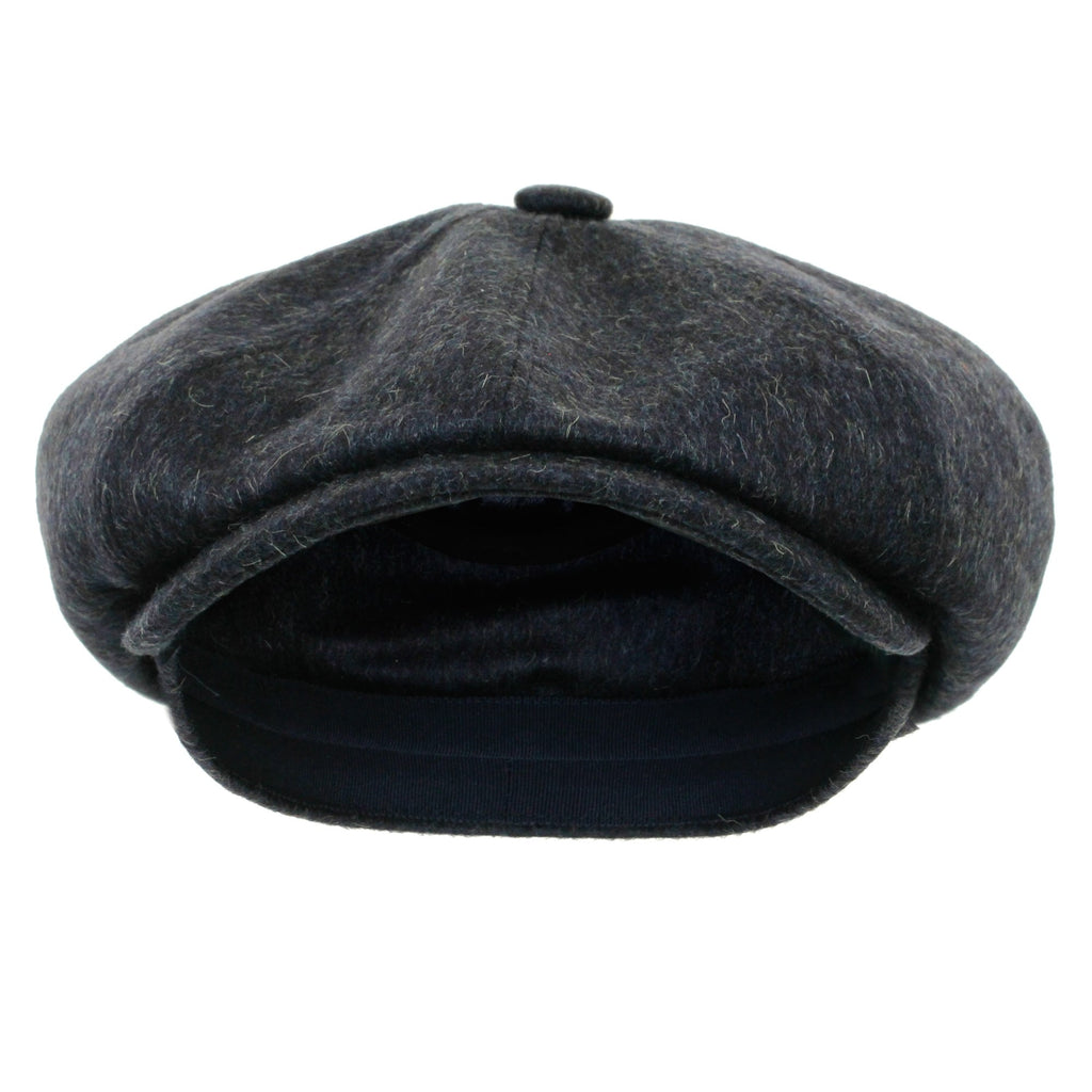 Dark grey herringbone flat cap from the front, showing the brim and interior lining.