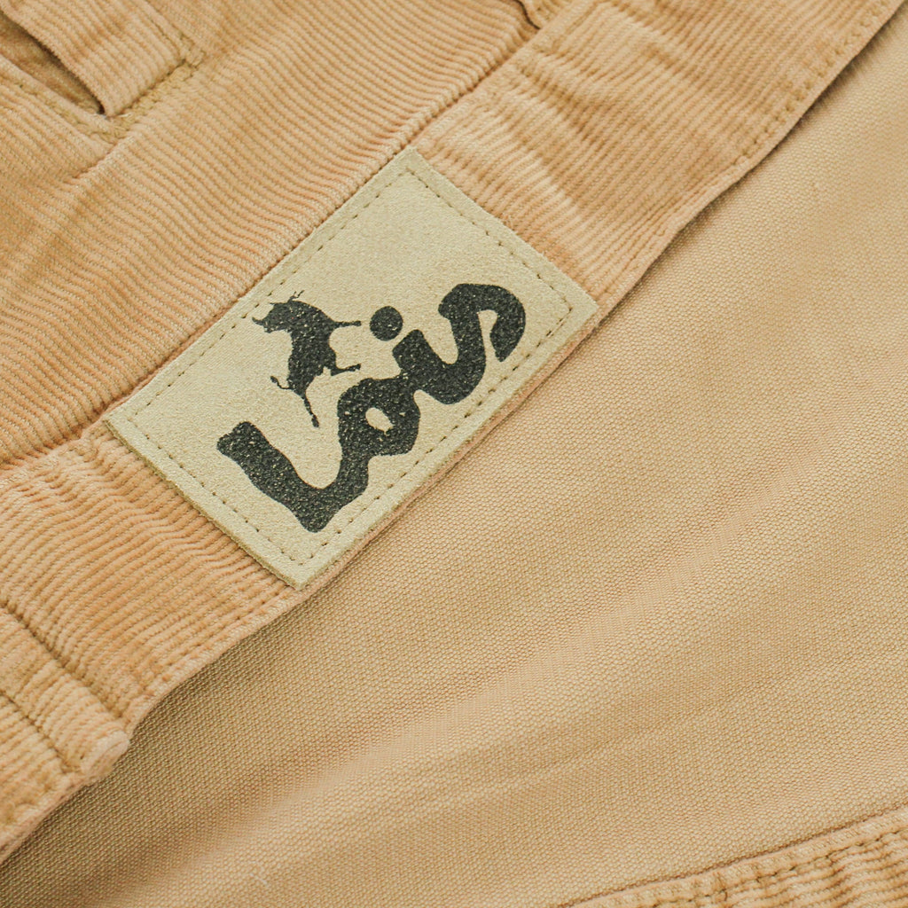 Close-up of the Lois branding on the inner label of the corduroy jacket.