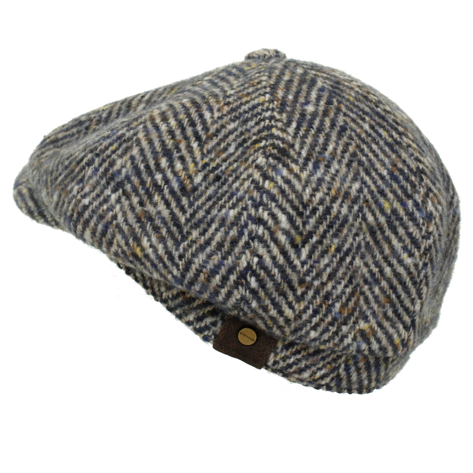 A fashionable grey and brown herringbone tweed flat cap, showcasing its unique pattern.