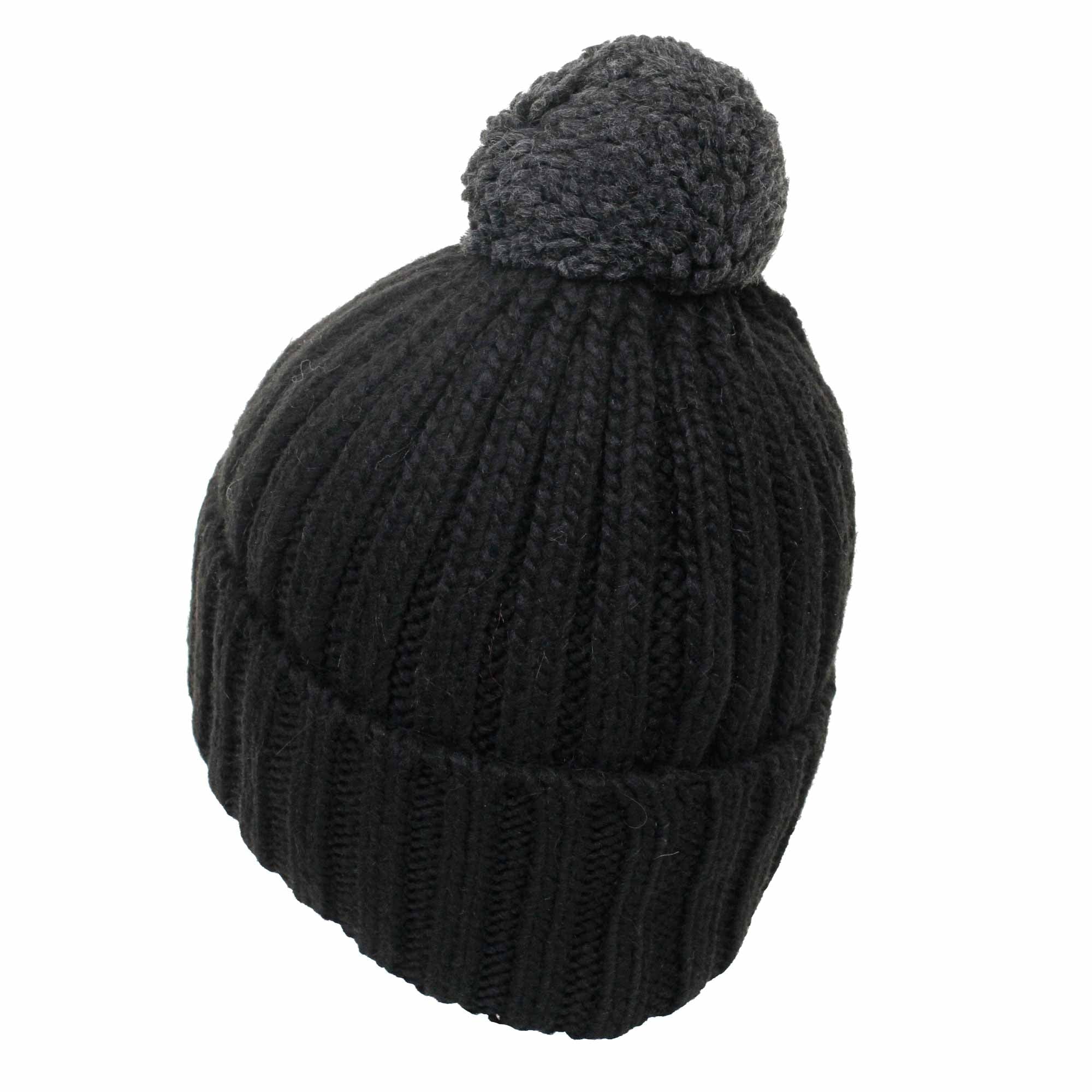 A black knitted bobble hat with a dark grey pom-pom, viewed from the side.