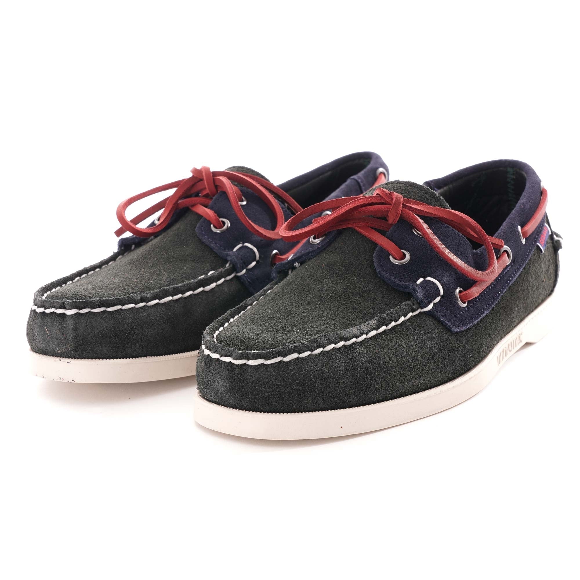A pair of Sebago Baracuta Portland boat shoes with red laces, angled from the front.