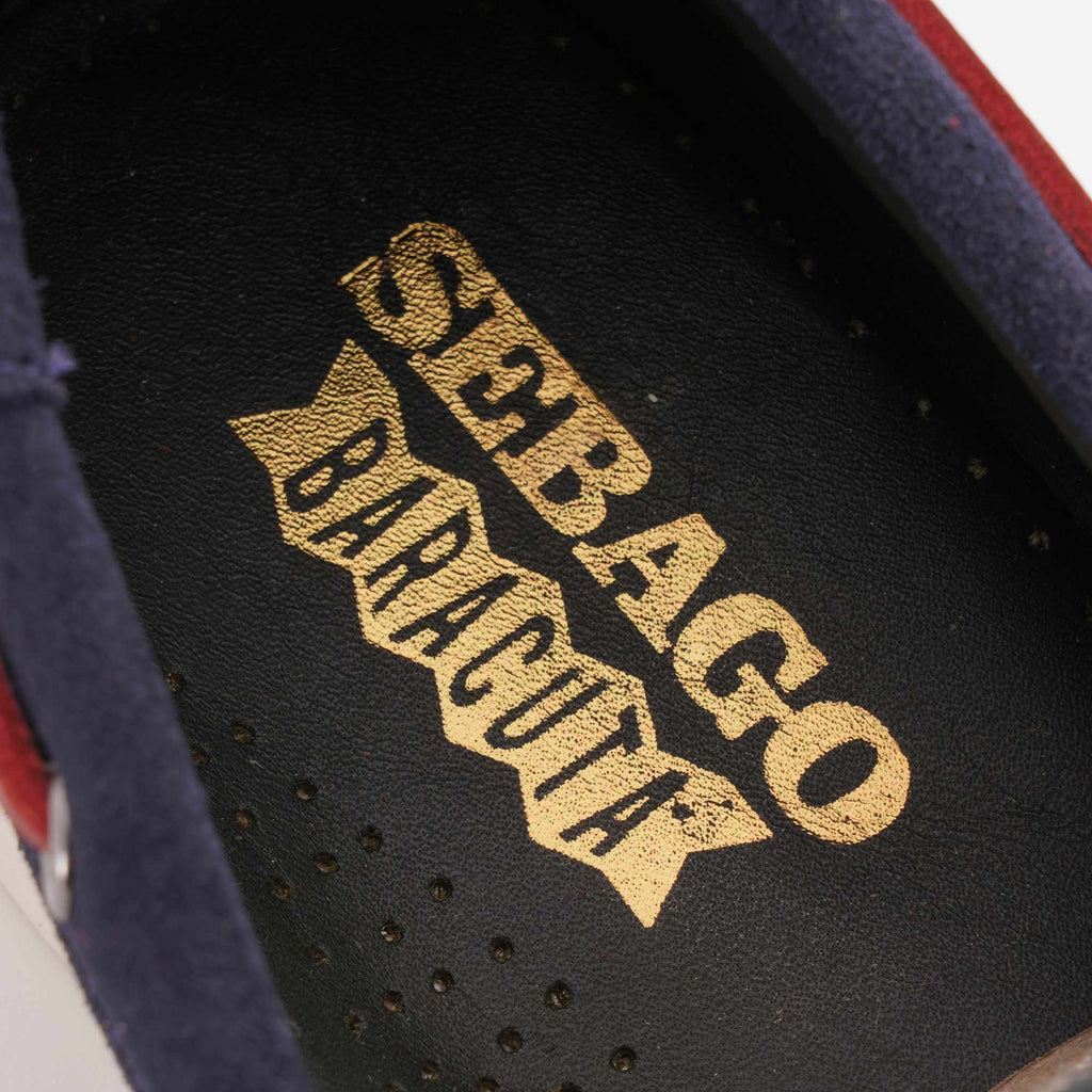 The 'Sebago Baracuta' branding in gold on the shoe's insole.