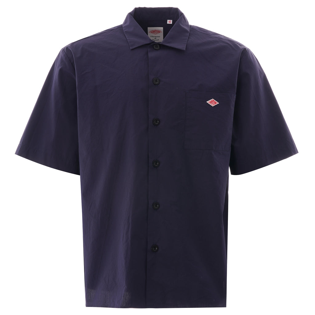 Navy blue short-sleeved shirt with a small red diamond logo on the left chest. This is a front view.