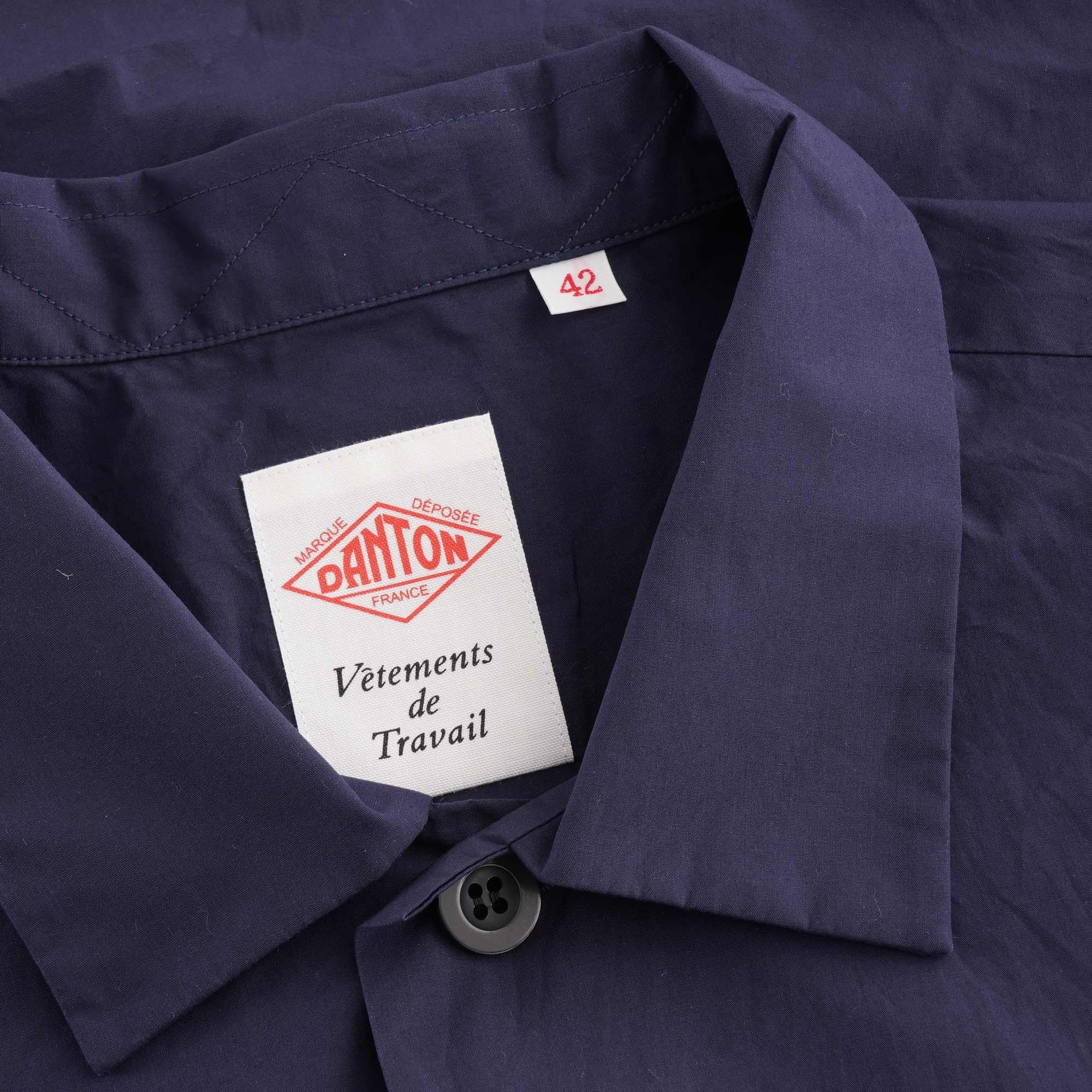 Close-up of the shirt's collar, showing the Danton brand label and size tag.