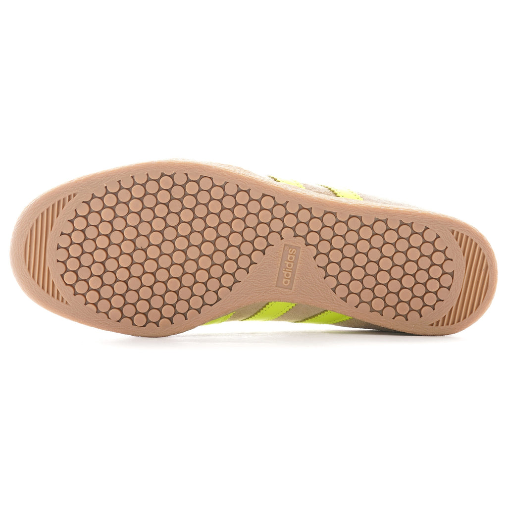 Bottom sole of an Adidas Campus 80s trainer, showing hexagonal grip pattern.
