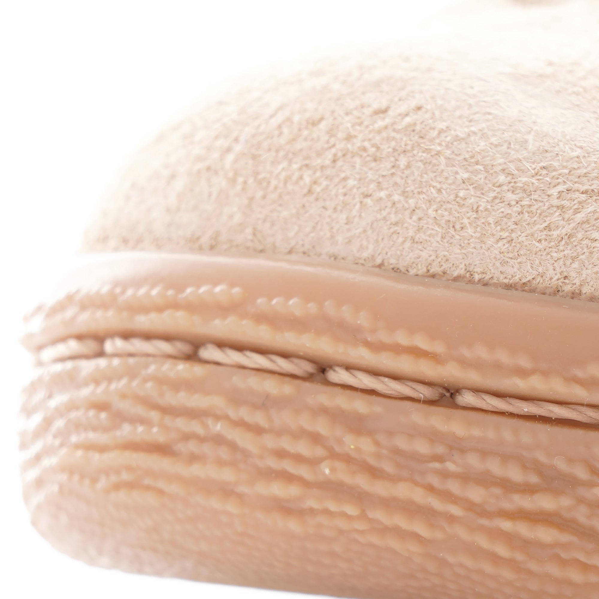Close-up of the textured rubber foxing and stitching on an Adidas Campus 80s shoe.