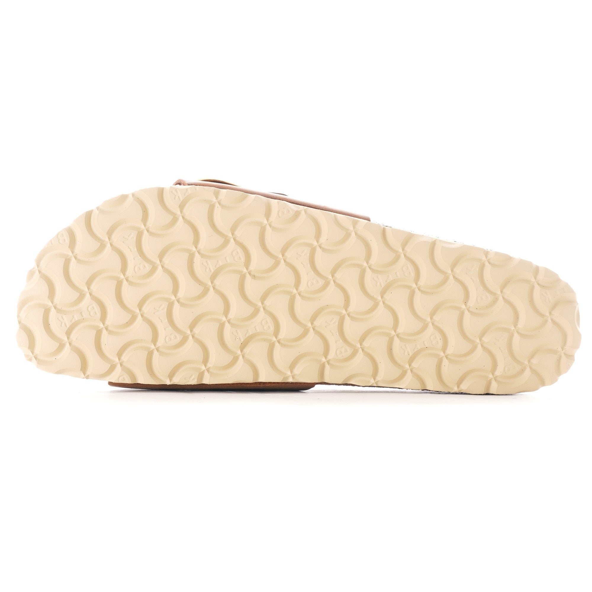 Bottom view of a brown sandal with a textured cream sole.