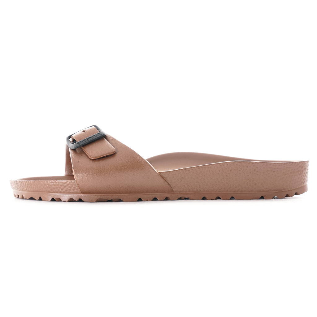 Side profile of a single brown Birkenstock Honolulu EVA sandal.