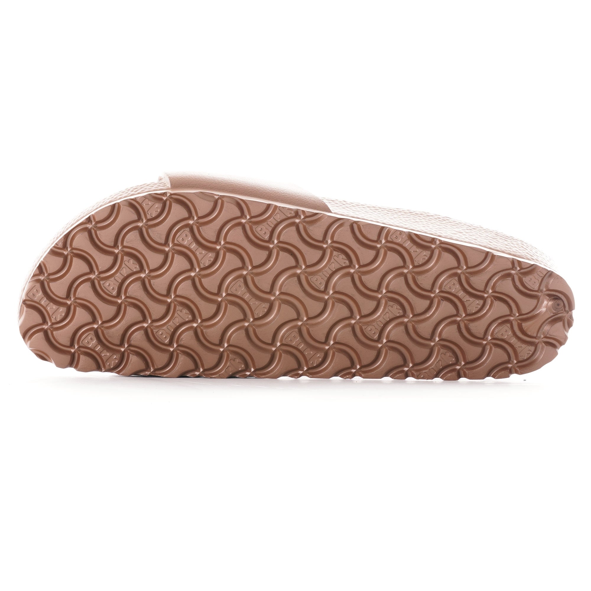 Sole of a brown Birkenstock Honolulu EVA sandal, showing the patterned tread.