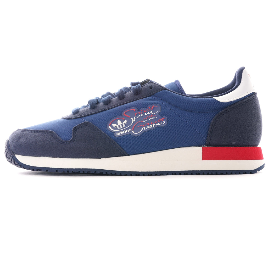 A close-up view of the right Adidas TRX Soulround shoe, showcasing its classic design.