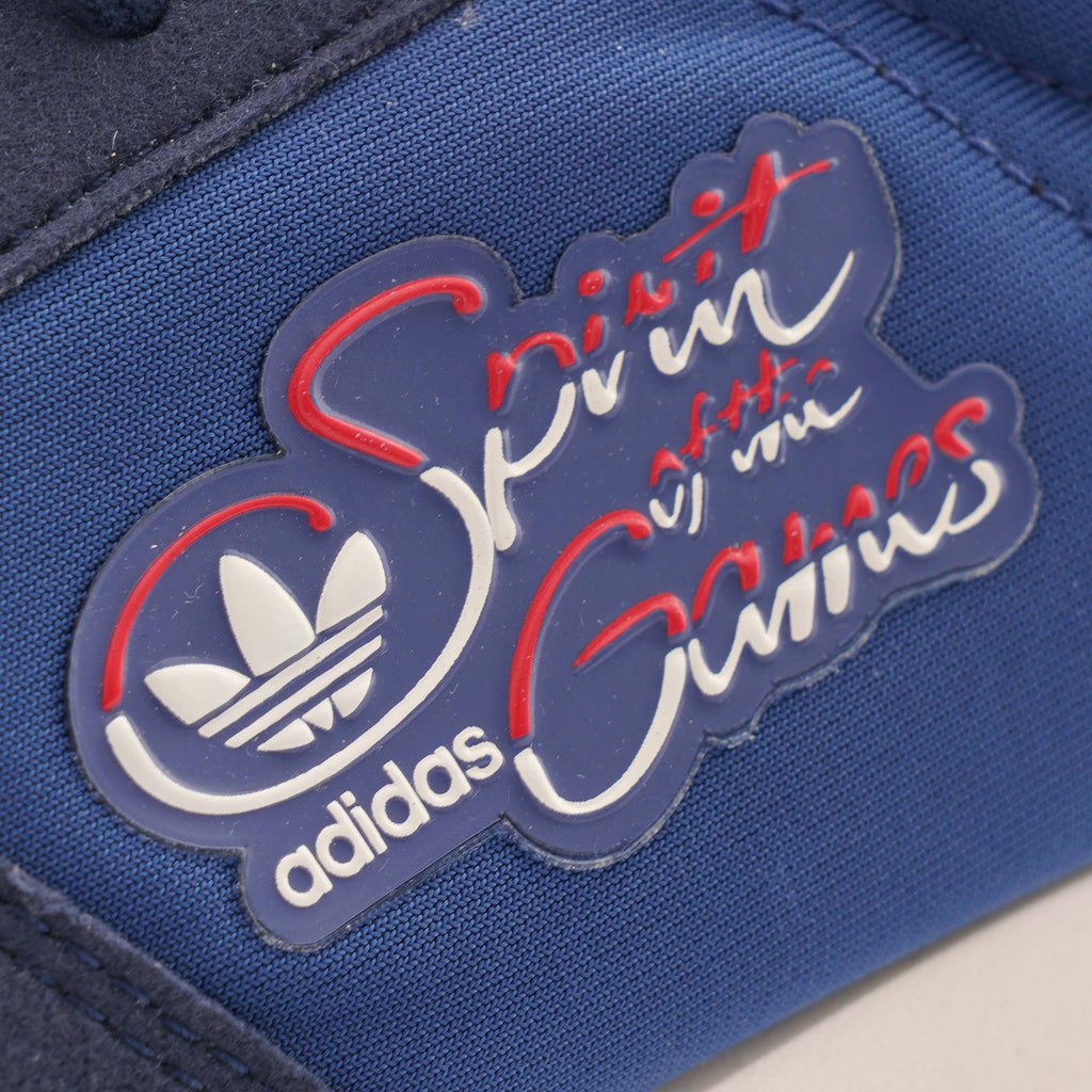 A close-up of the Adidas TRX Soulround logo on the shoe's side panel.