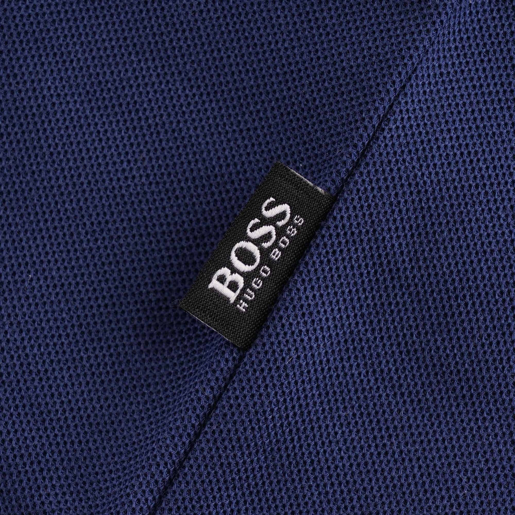 Close-up of the t-shirt's hem, showing a small black BOSS brand tab.
