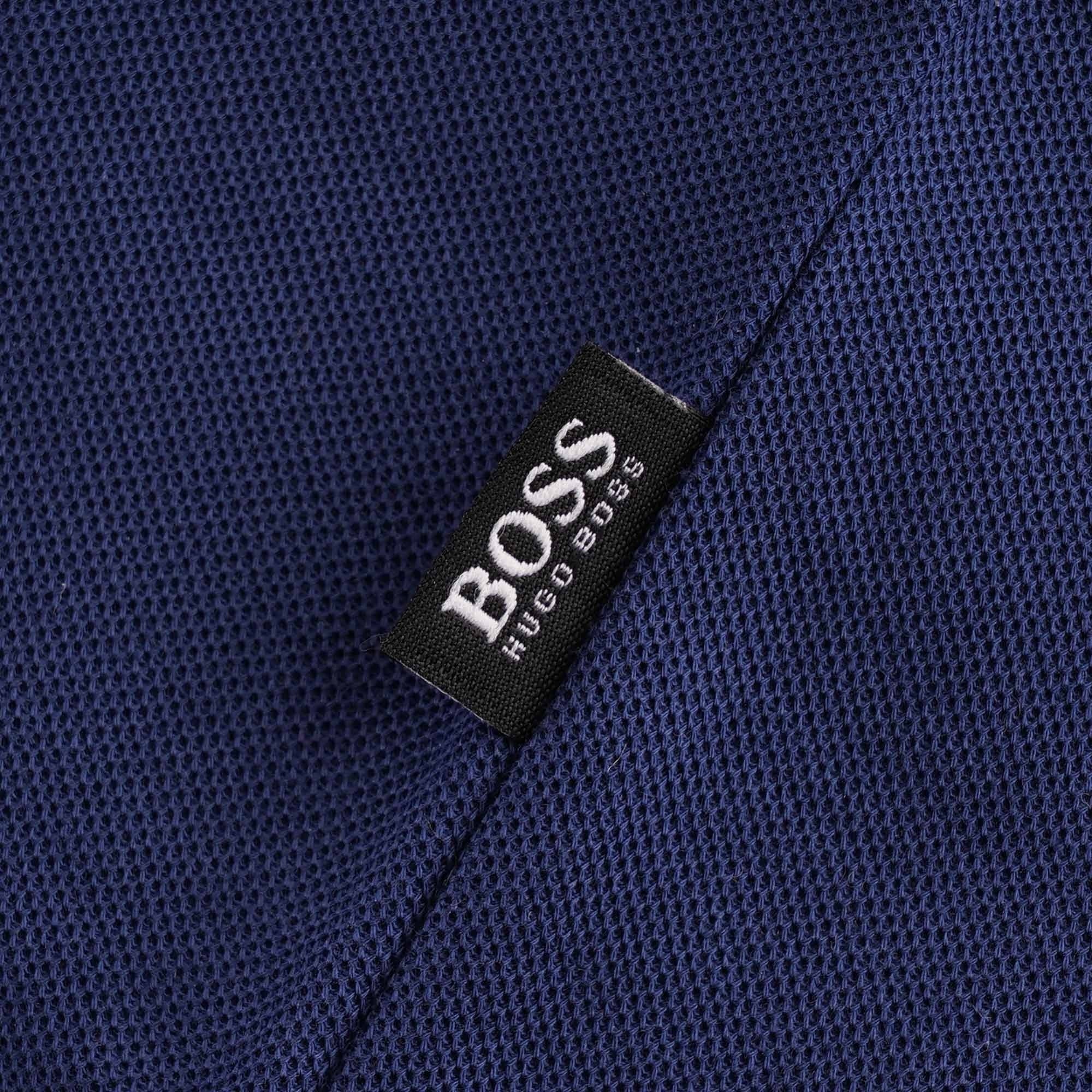 Close-up of the t-shirt's hem, showing a small black BOSS brand tab.