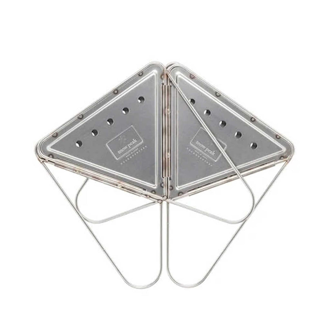A four-sided stainless steel fire pit folded flat, against a white background.
