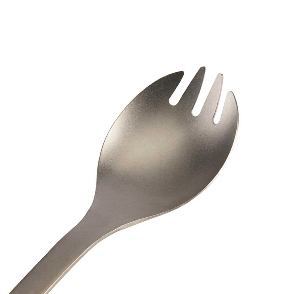 A spork, a combination of a spoon and a fork, made from durable titanium.