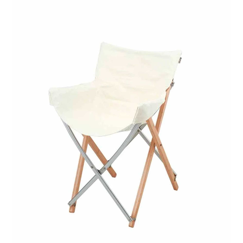 A white canvas and wooden-framed folding chair, ready for use.