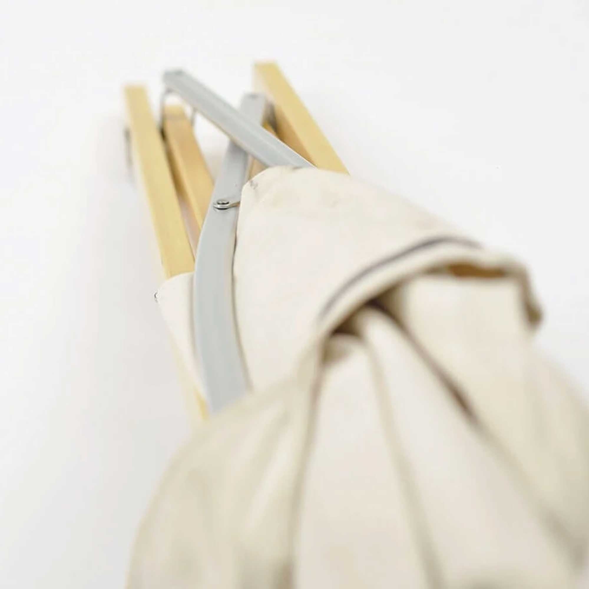 The chair fully folded, showing its compact form for storage.