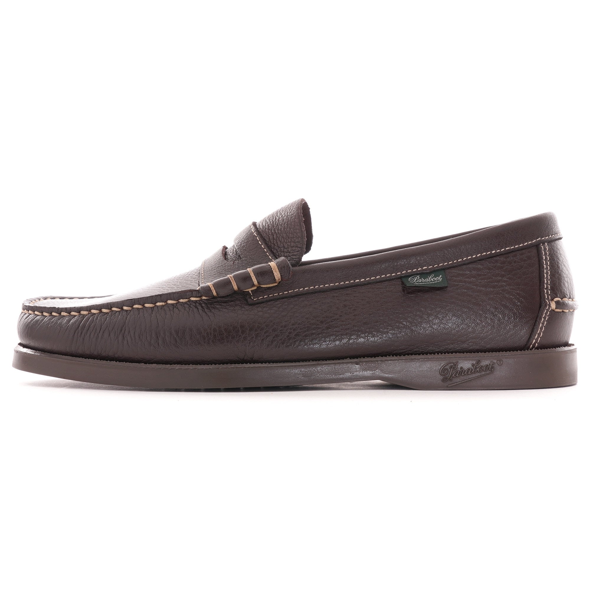 Side profile of a single brown leather Paraboot Coraux loafer.
