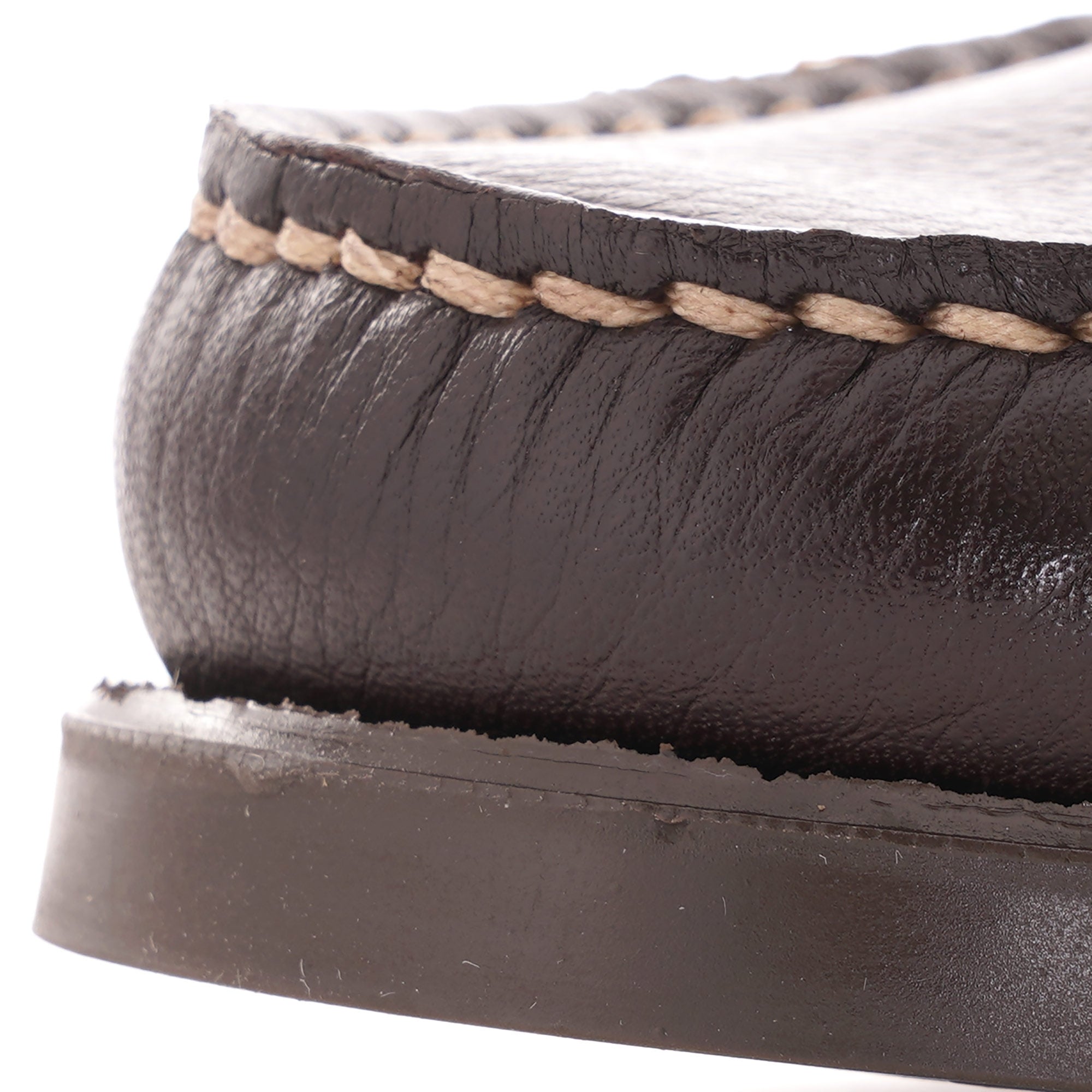 Close-up of the hand-stitched moc toe on the brown Paraboot Coraux loafer.