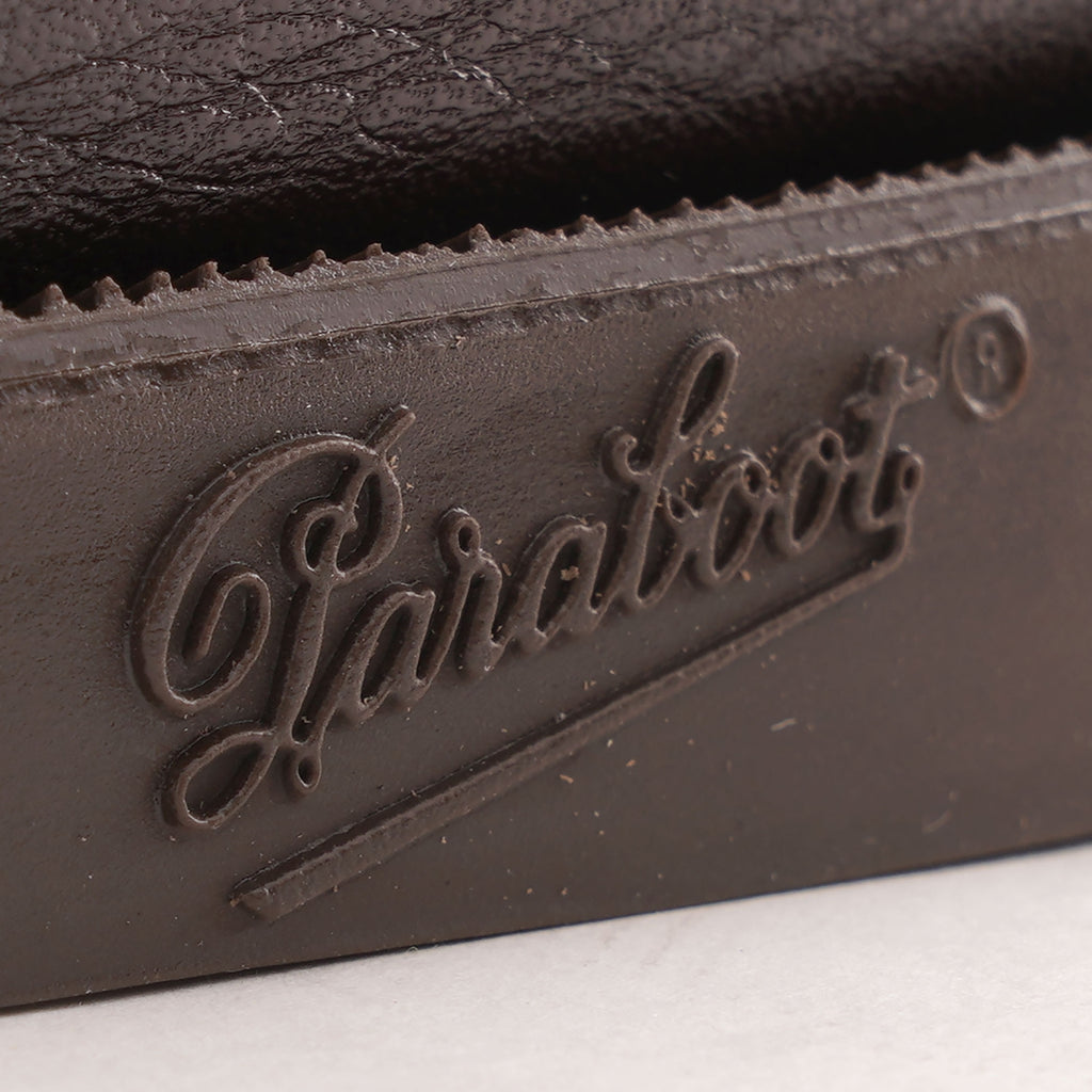 Close-up of the Paraboot logo debossed into the side of the shoe's sole.