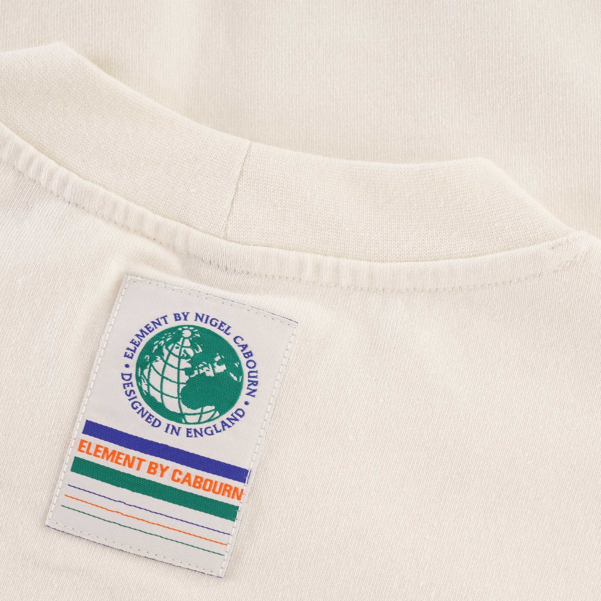 A close-up of the t-shirt's inner label, displaying the brand logo and text.