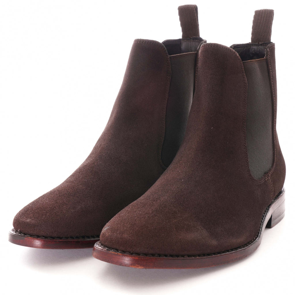 Pair of brown suede Chelsea boots with elasticated sides and pull tabs.