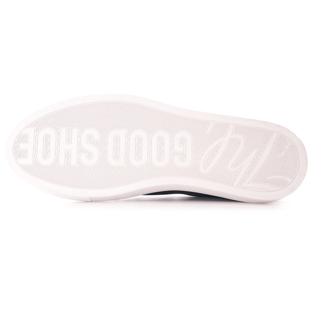 The sole of a dark blue shoe with white embossed text, 'GOOD SHOE'.