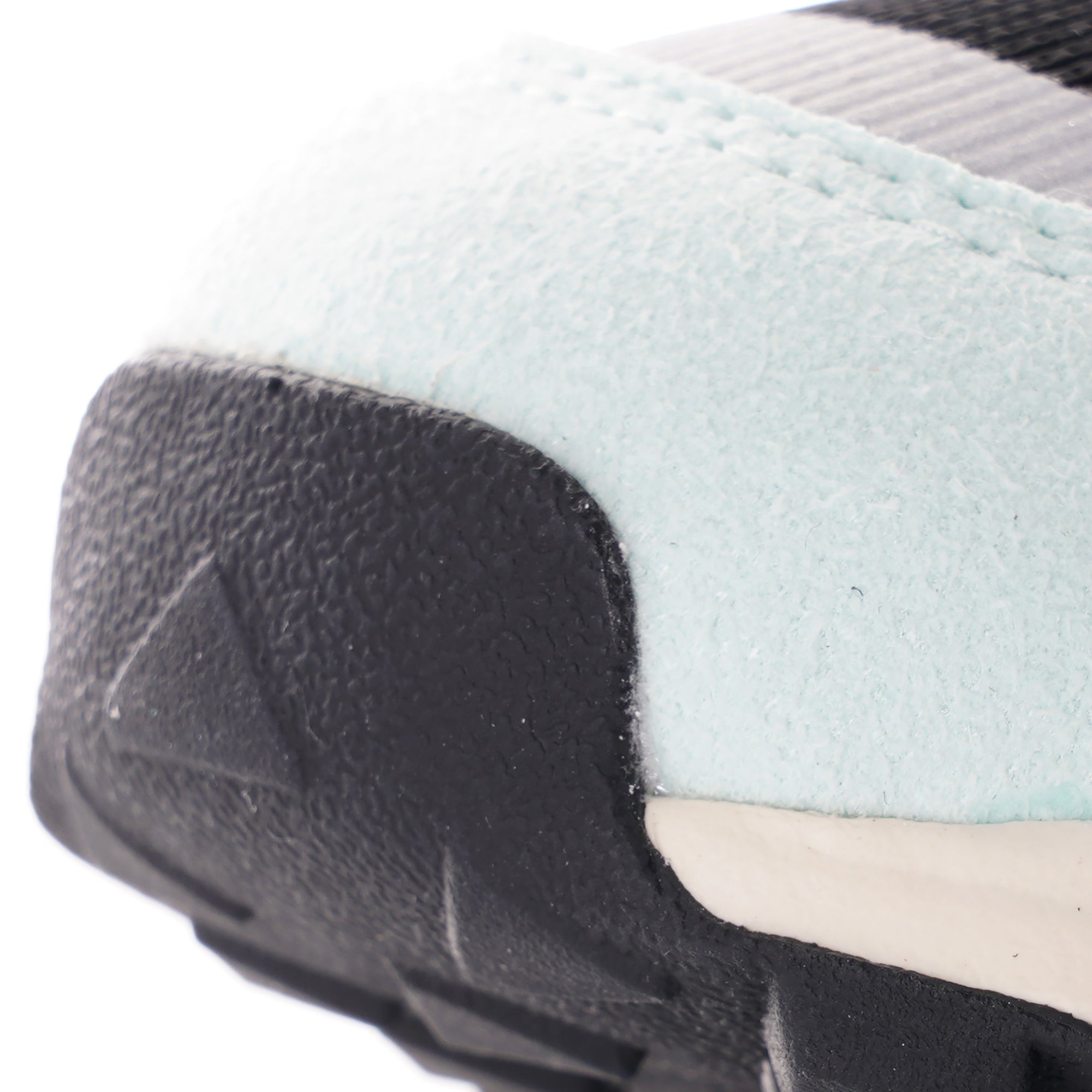 Close-up of the toe of an Adidas ZX 8000 Clear Aqua trainer.