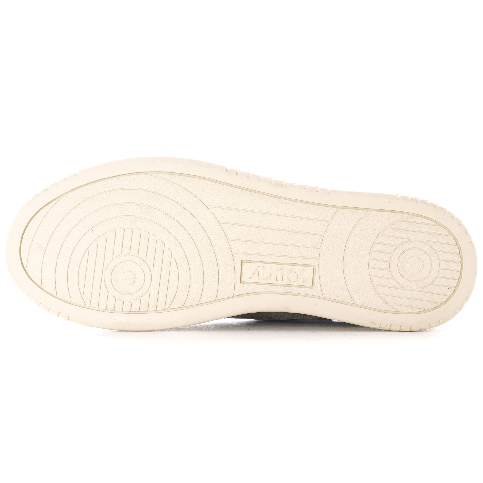 The textured white sole of an Autry Medalist Low sneaker.