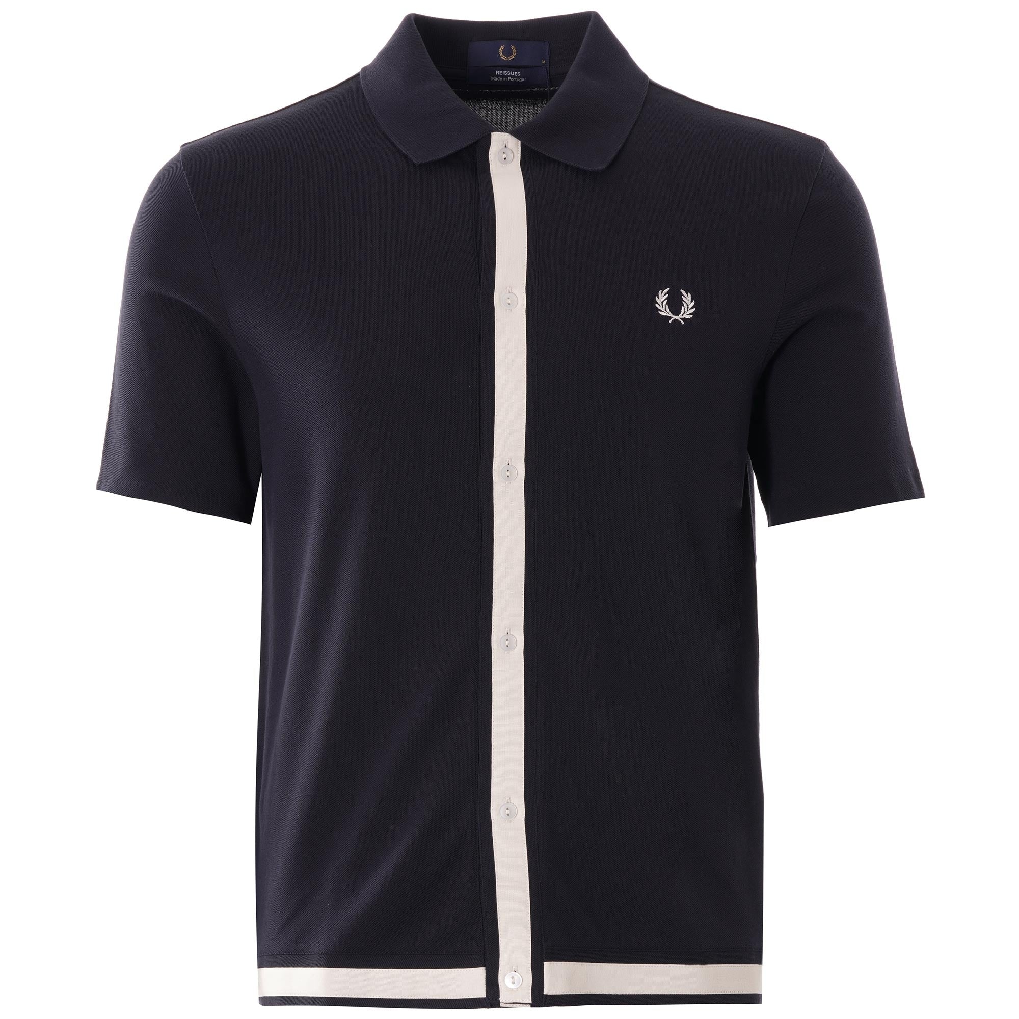 A navy Fred Perry knitted shirt with a full-length button placket and contrasting white stripe.