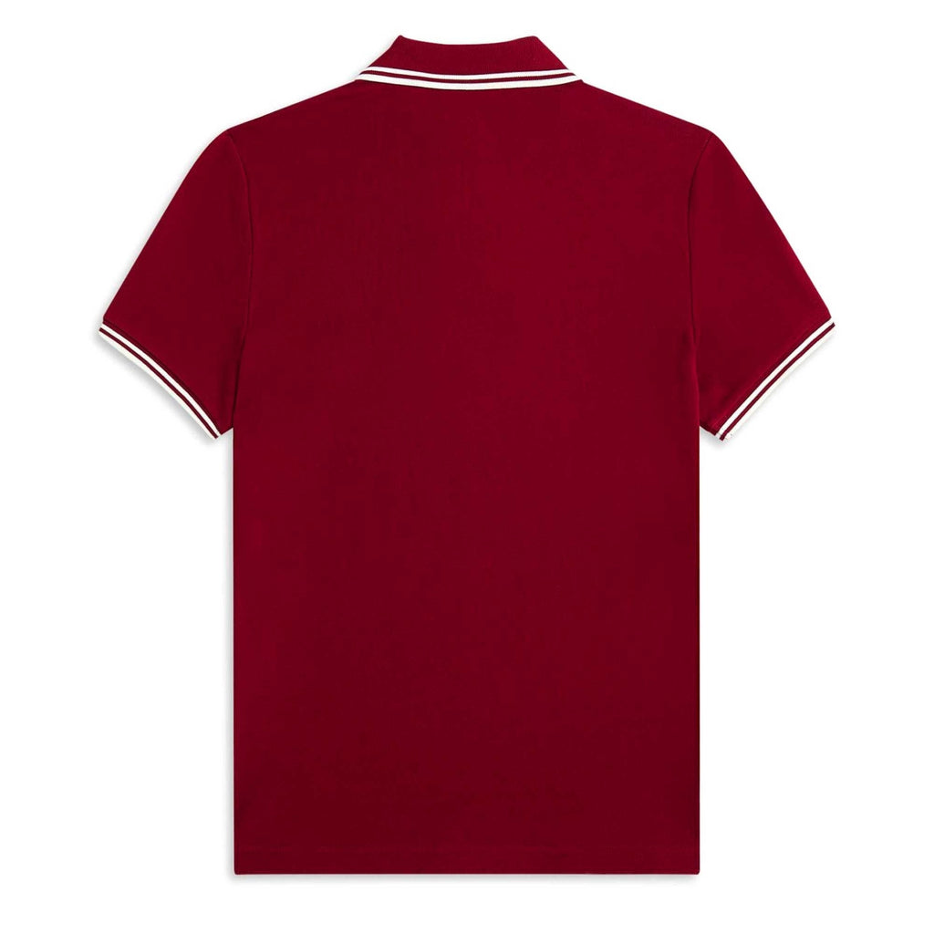 The back of a Fred Perry polo shirt in a rich, dark red with white twin-tipping.