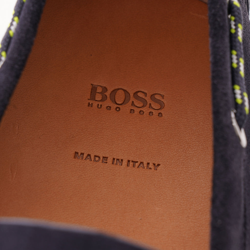 A close-up of the tan leather insole with the BOSS Hugo Boss logo and 'Made in Italy'.