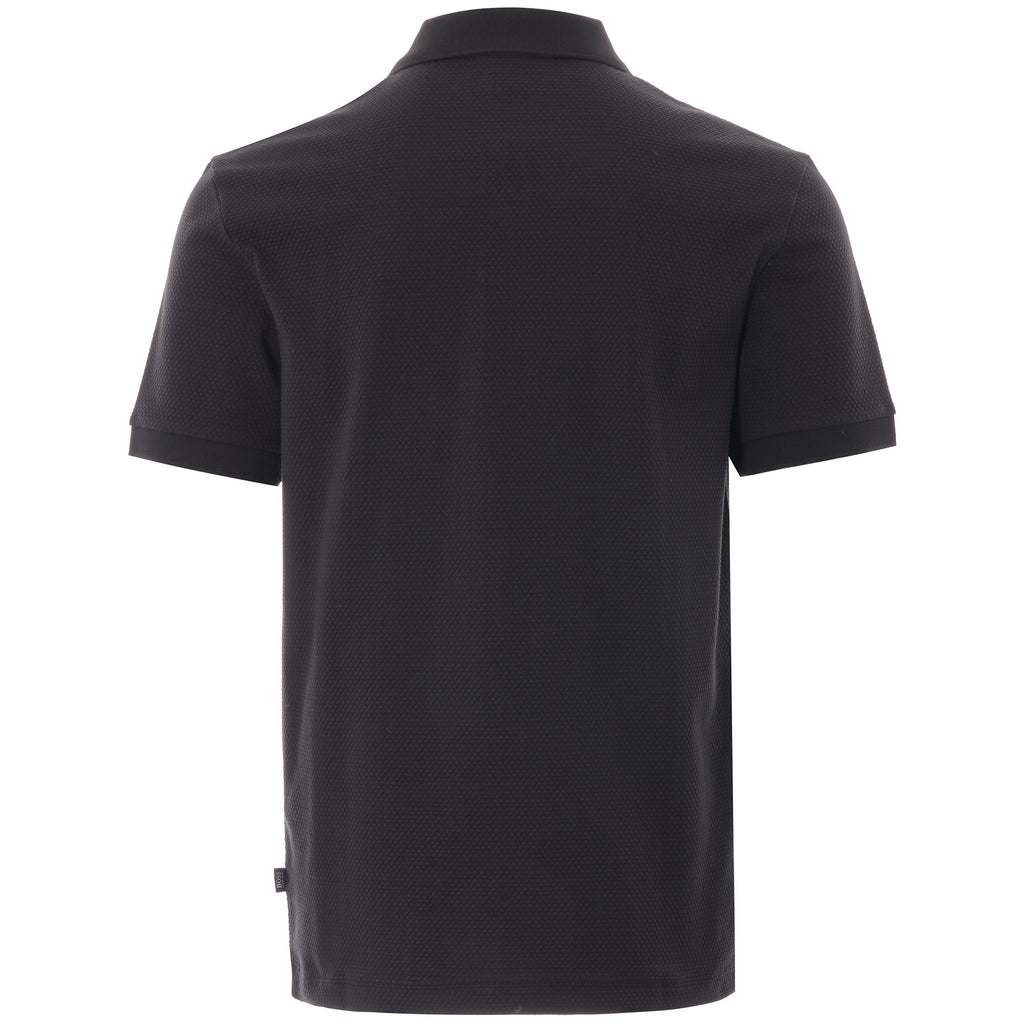 Rear view of a black polo shirt, showcasing its simple, clean design.