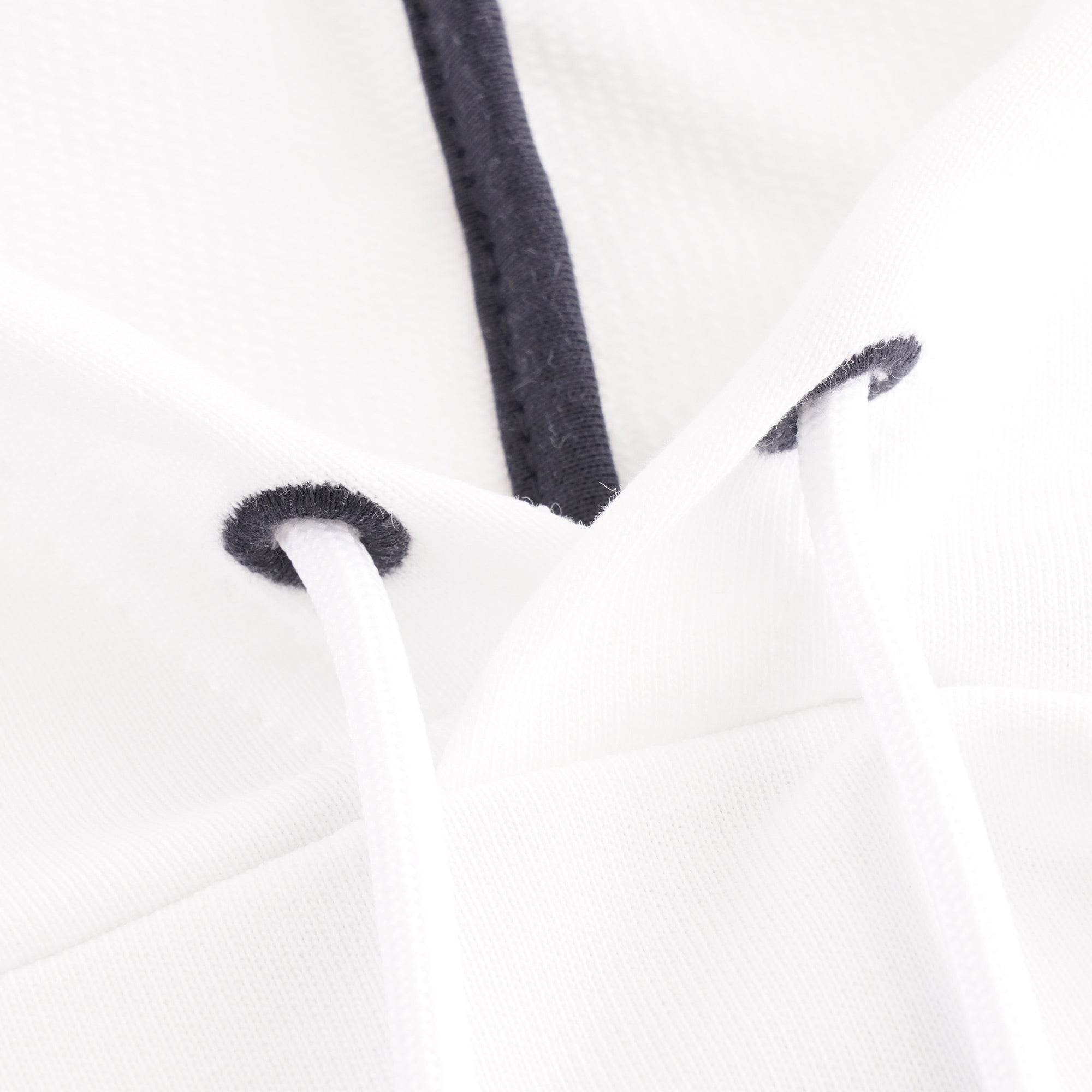 Close-up of the white drawstrings with black aglets on the BOSS hoodie.