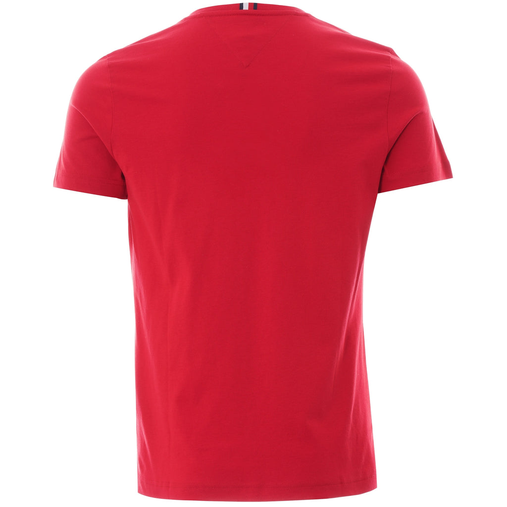 The back view of a plain red Tommy Hilfiger T-shirt with short sleeves.