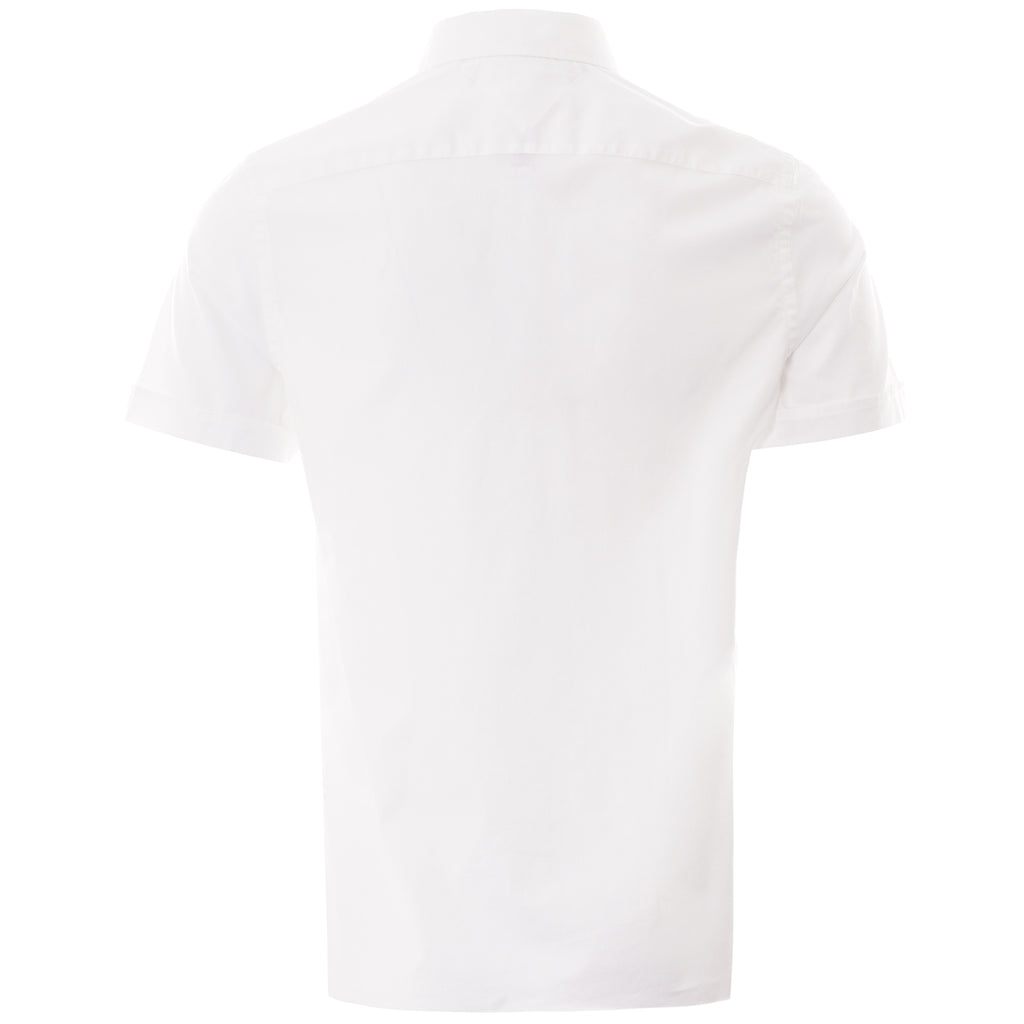 The back of a plain white Tommy Hilfiger short sleeve shirt.