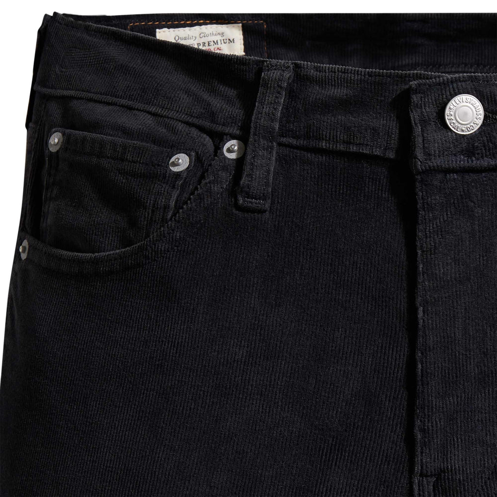 A close-up of the front left pocket of the Levi's 511 Slim Fit Cords in black.