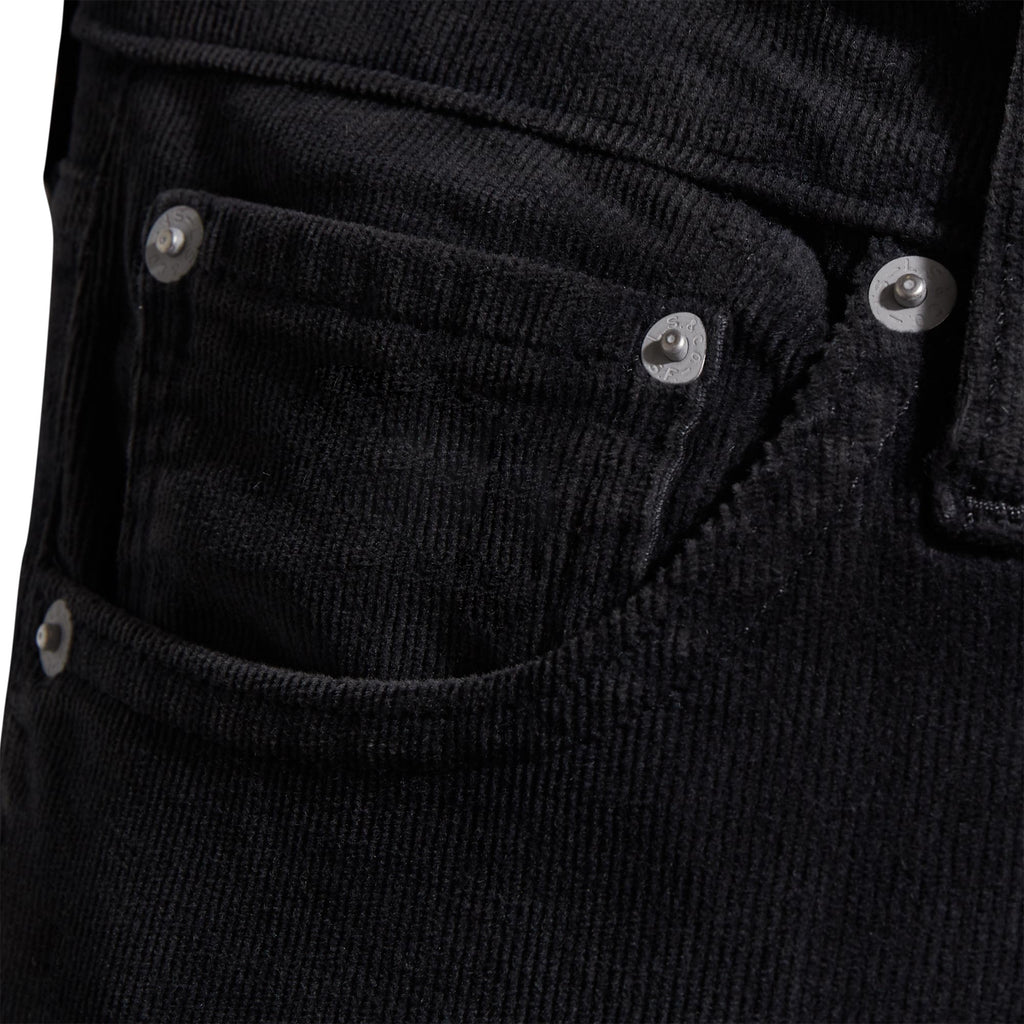 A close-up of the front right pocket of the Levi's 511 Slim Fit Cords in black.