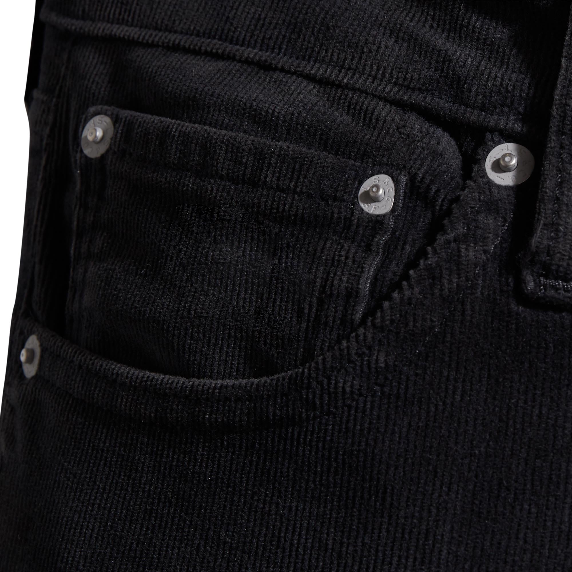 A close-up of the front right pocket of the Levi's 511 Slim Fit Cords in black.