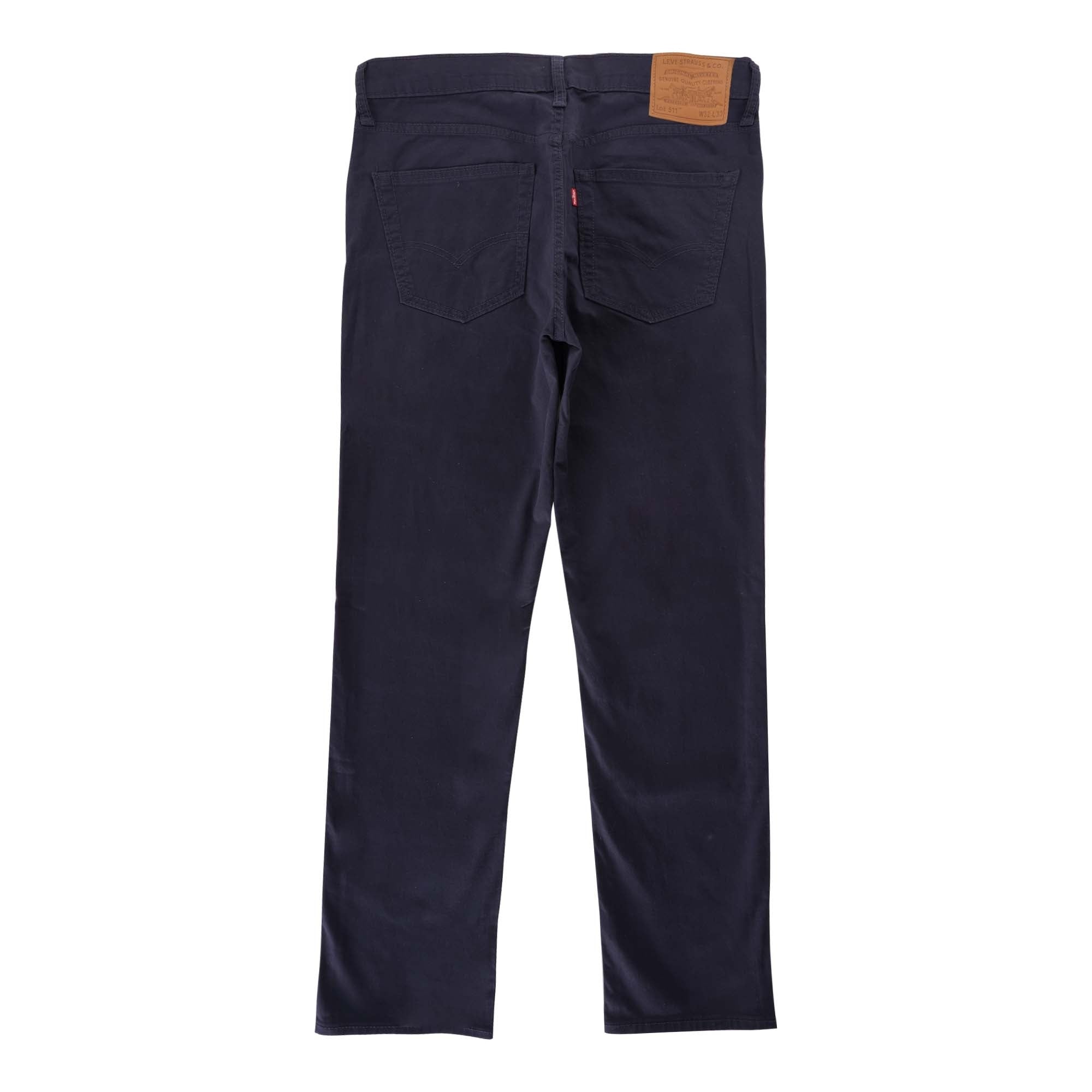 Full back view of navy Levi's 511 slim fit corduroy trousers on a white background.