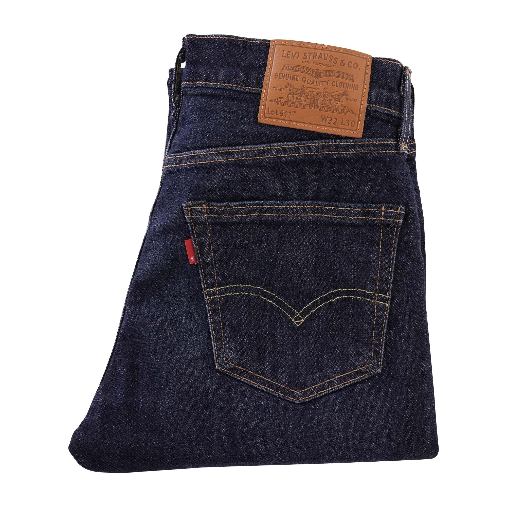 A close-up view of the folded dark wash Levi's 511 slim fit jeans.