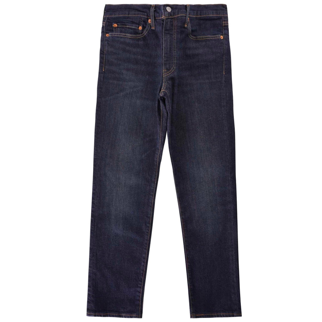 A pair of dark wash Levi's 511 slim fit jeans, displayed flat on a white background.
