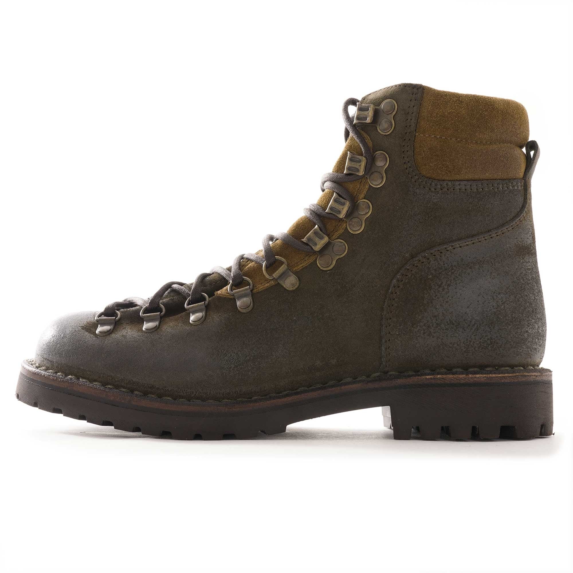A single, dark olive-green suede hiking boot with a brown padded cuff, side view.