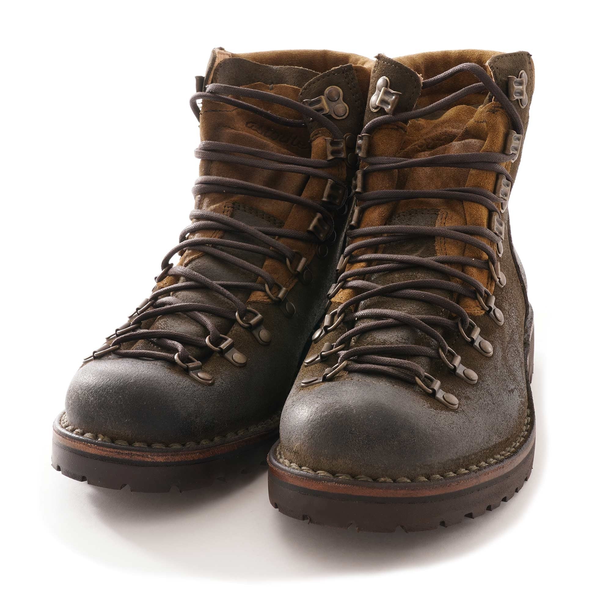 A pair of dark olive-green suede hiking boots with brown padded cuffs, front view.