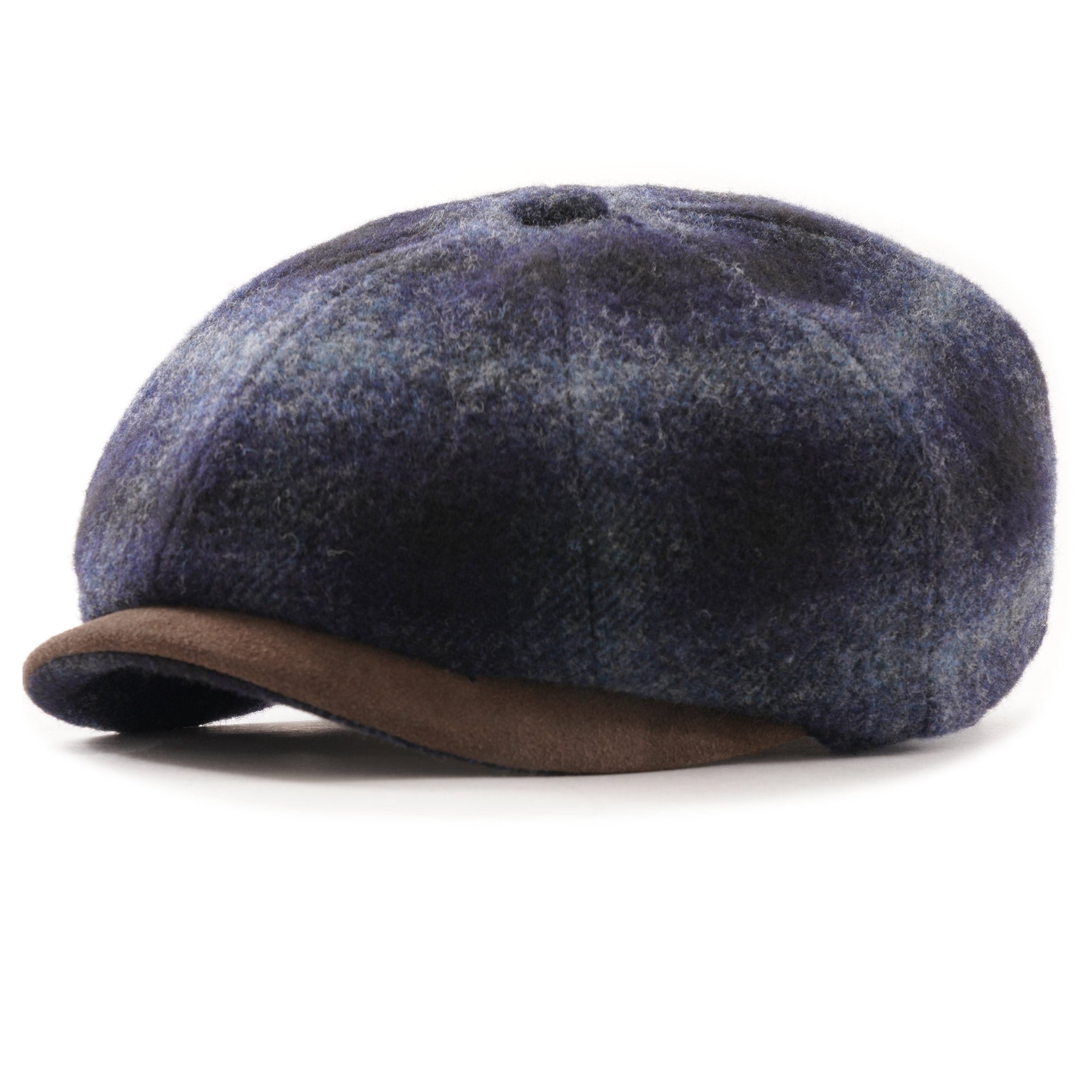 Front view of a blue and black check flat cap with a brown suede peak.