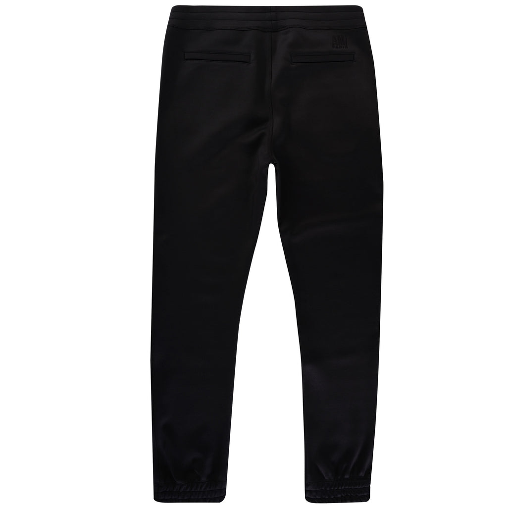 Rear view of the black jogging bottoms, showing the complete design from behind.