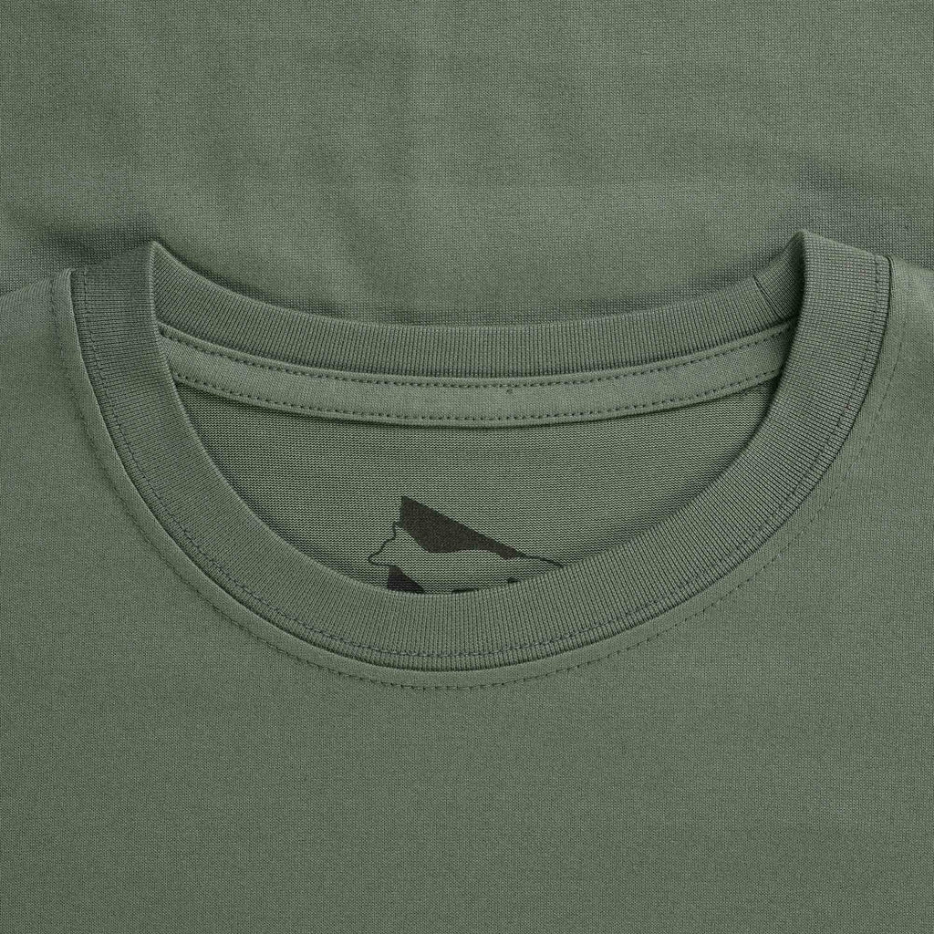 Close-up of the round collar of an olive green t-shirt.