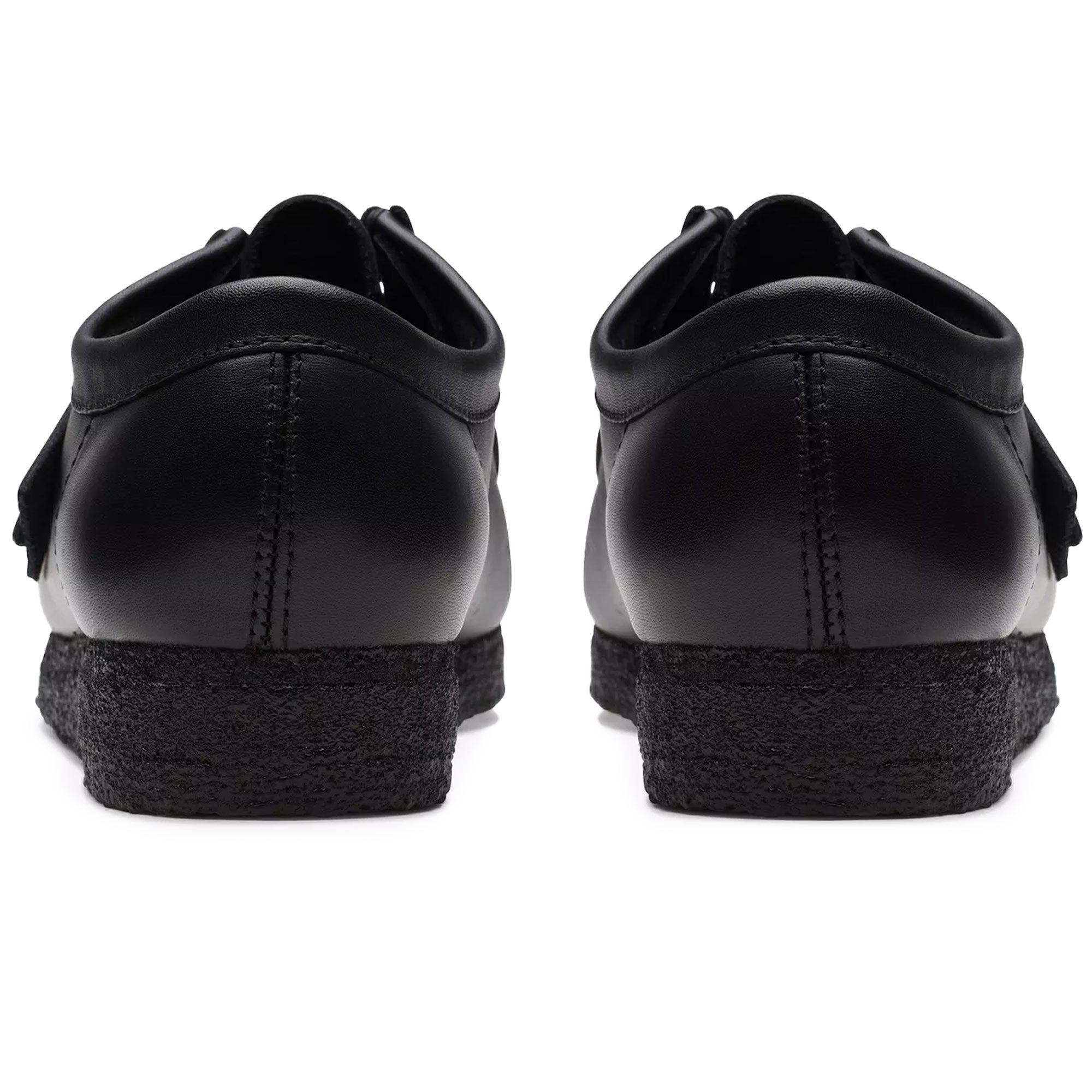 Rear view of a pair of black leather Clarks Originals Wallabee shoes.