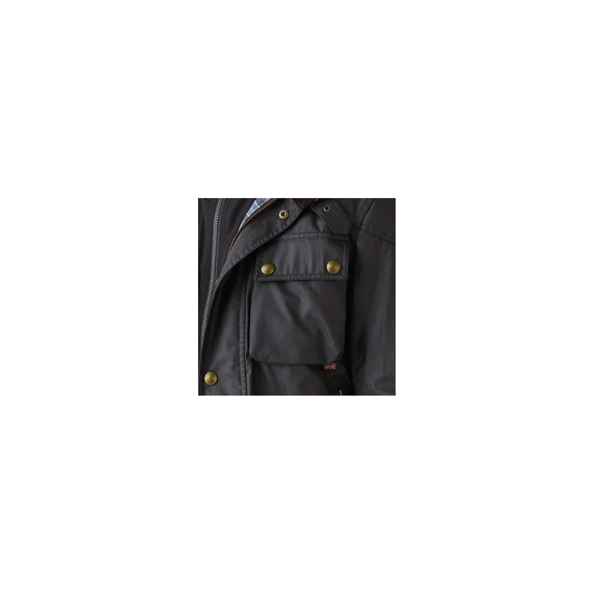 The upper right pocket of a black jacket with brass fastenings.